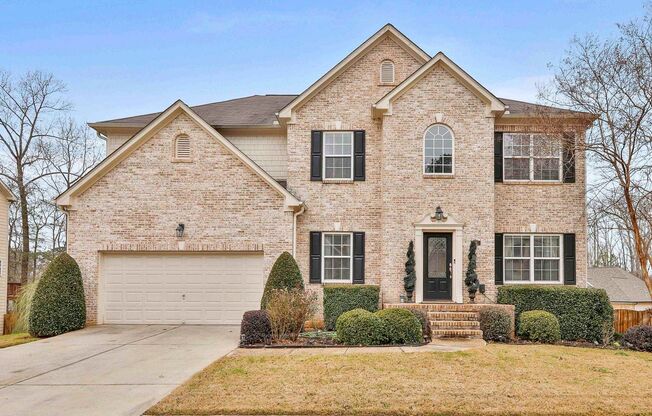 WOW! HUGE luxurious 4 bedroom corner lot home with a finished basement!  MUST SEE!