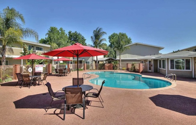 Swimming Pool Area With Shaded Chairs at Ranchero Plaza, San Jose, CA