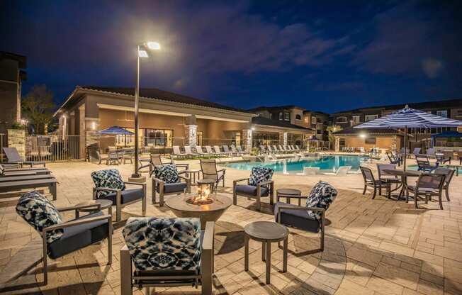 Pool side patio and sundeck at night at Level 25 at Sunset by Picerne, Nevada