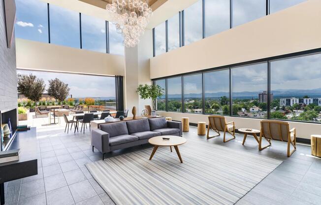 Soaring ceilings and sweeping views set the stage for this airy indoor-outdoor lounge—perfect for casual hangs or hosting with ease.