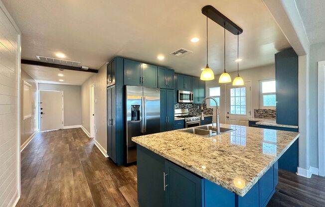 Beautifully Renovated Stand Alone Home Featuring Gourmet Kitchen With Oversized Island And Views of Downtown San Diego!