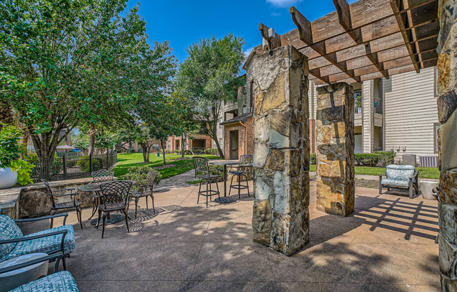 Outdoor Grill With Intimate Seating Area at River Pointe, Conroe