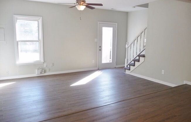 Fully updated townhome located walking distance to shops and close to interstates!
