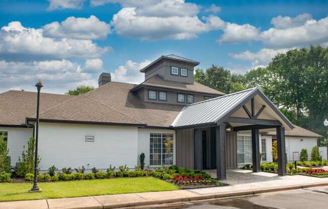 a white house with a brown roof at Lincoln at Wolfchase, Cordova, TN
