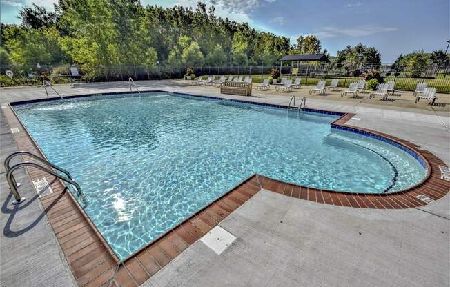 take a dip in the resort style pool at Evergreen Luxury Apartments, Merrillville, IN