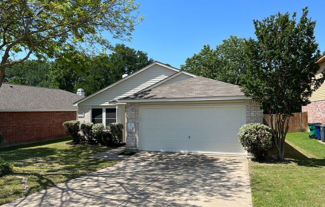 Happy home with a spacious floor plan that backs up to a greenbelt!