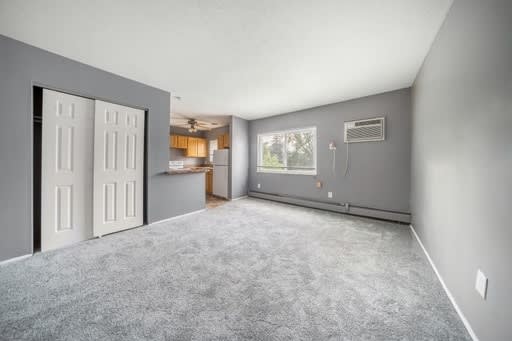 an open living room with a kitchen in Cleveland