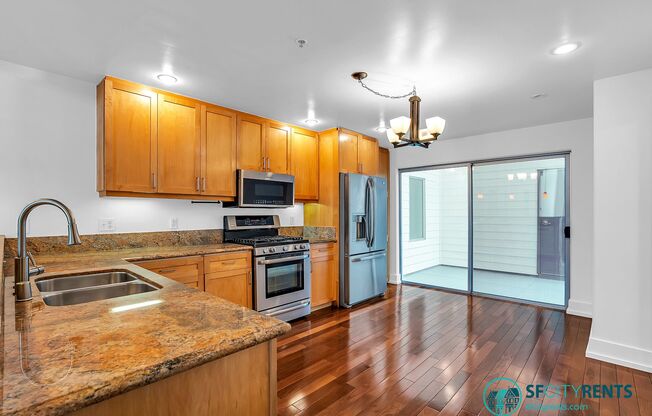 SoMA: Oversized Loft w/ 2 Bonus Rooms + 2 Full Bathrooms, Private Patio & Parking Included