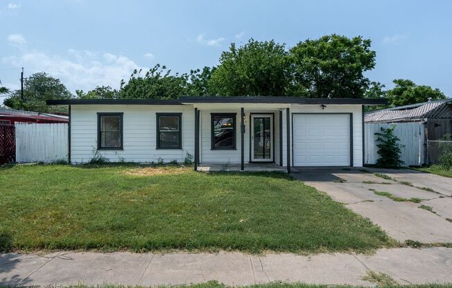 CENTRAL CITY FOUR BEDROOM TWO BATH HOUSE!