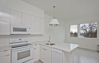 The Bridgetown Apartments White Kitchen Appliances