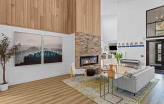 a rendering of a living room with a stone fireplace and wood floors