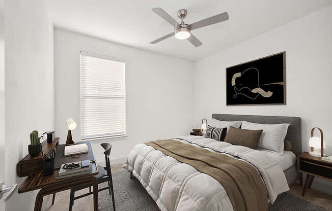 Model Bedroom with Carpet and Window View at Alta 3Eighty Apartments located in Aubrey, TX.