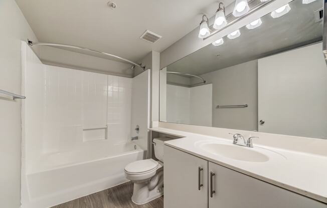 Bathroom with tub/shower combo, toilet and sink at Pembroke Pines Landings, Pembroke Pines, FL, 33025