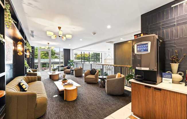 A modern living room with a balcony overlooking the outdoors.