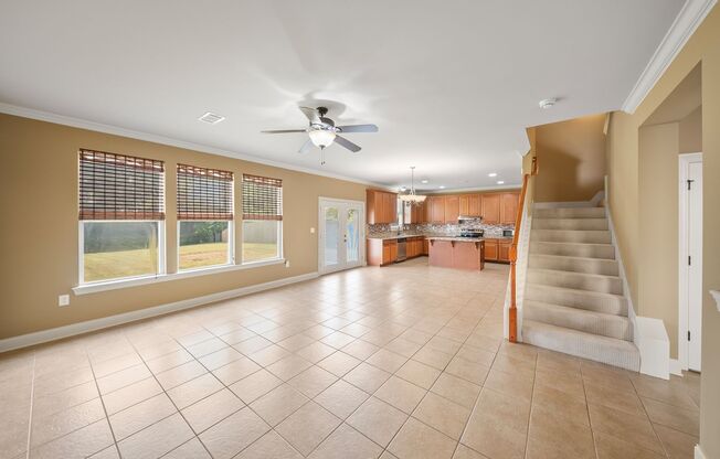 3 Bedroom home with a Bonus area! Sits on a Lake with a fenced yard!