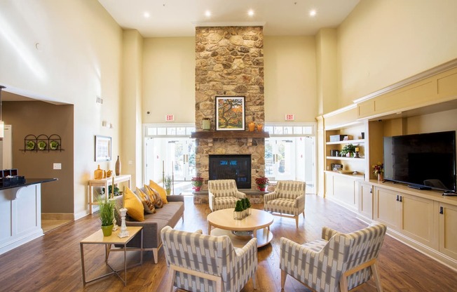 Avenel at Montgomery Square - Resident clubhouse with fireplace