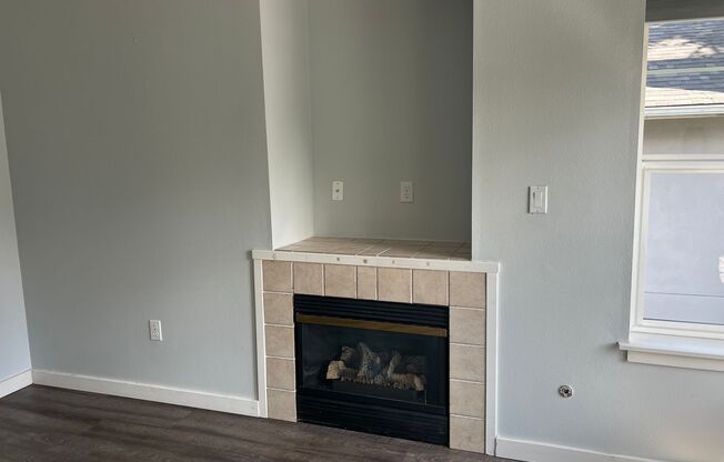 Vaulted Ceilings, Fireplace, LVP Flooring, TOP FLOOR! 2 Bedrooms, 2 Baths & Parking…