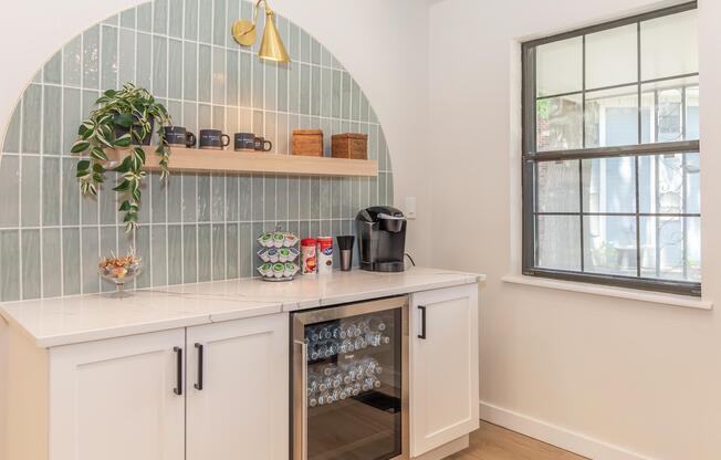 a kitchen with a sink and a window