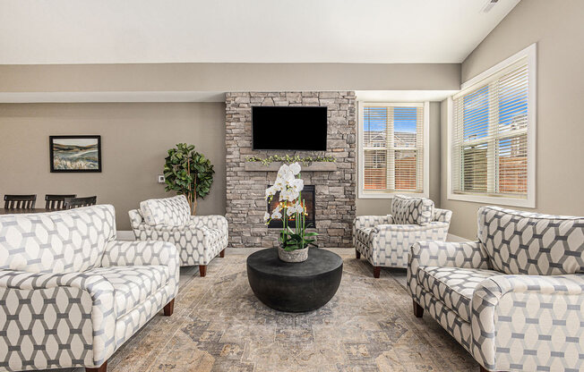 Community Building with fireplace  at Signature Pointe Apartment Homes, Alabama