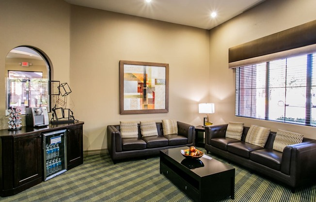 a living room with couches and a coffee table