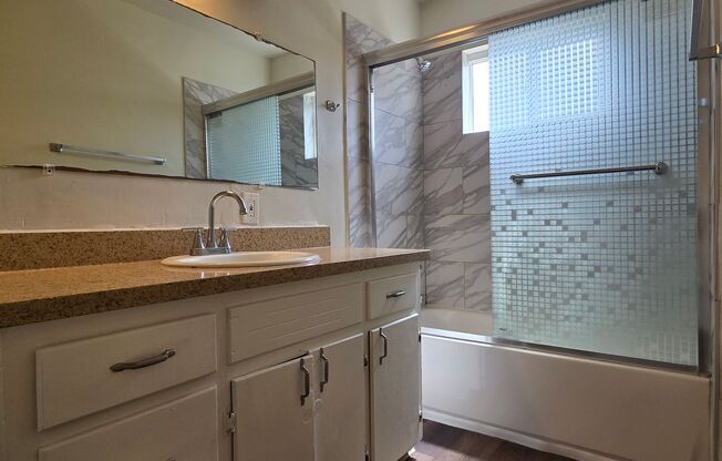 Spacious Downstairs Apartment, Fresh Paint, Quartz Counters, Stainless Steel Appliances, Pool, Parking!