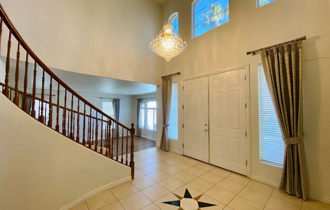 Stunning home in a guard gated community inside Rhodes Ranch with tons of community amenities. Almost 5,000 sq ft home with 3-car garage, 4 bedrooms with 4.5 bathrooms. Huge loft upstairs.