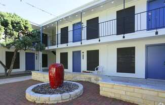 Soco at Alpine Outdoor Common area with fountain and Exterior building