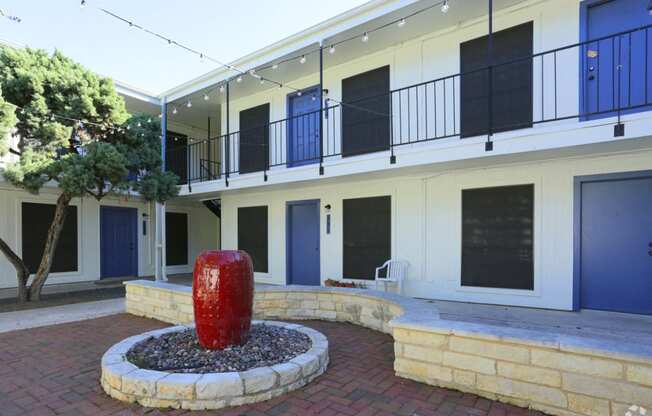 Soco at Alpine Outdoor Common area with fountain and Exterior building