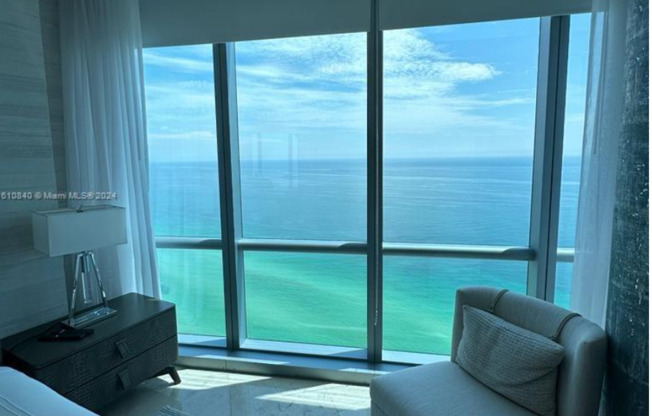 Breathtaking views from this fully furnished 2-bedroom + den residence for rent