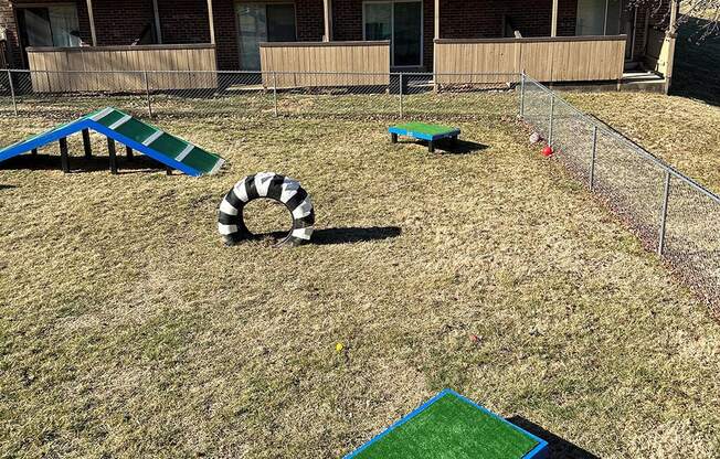 fenced dog park at apartment community