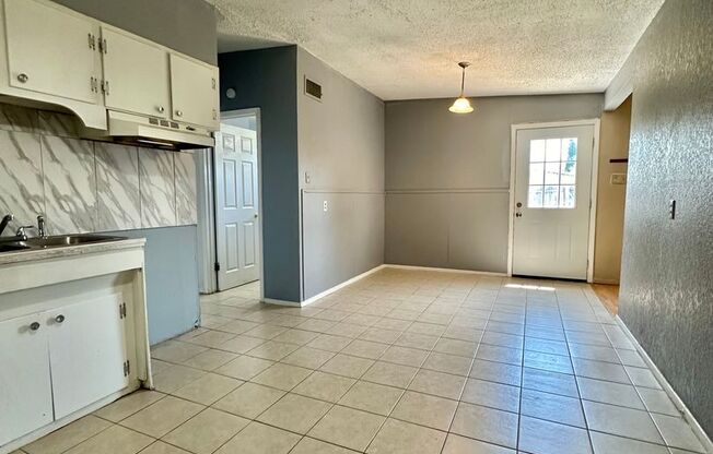 Spacious 4-Bedroom Home w/ Two Living Rooms!!