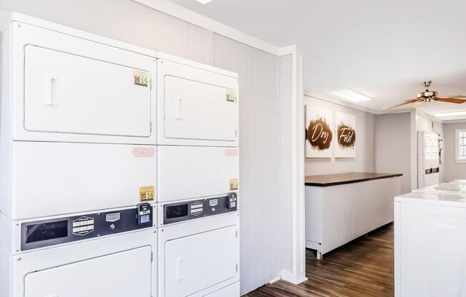 a kitchen with a stove and a refrigerator