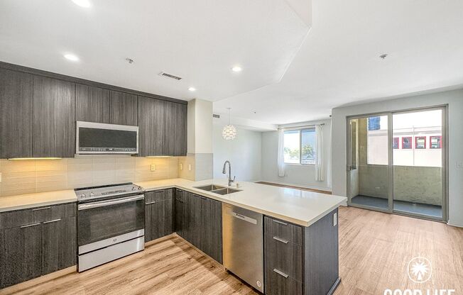 Luminous 3BD/2BA Corner Unit in Little Italy with City Views, W/D & Private Balcony