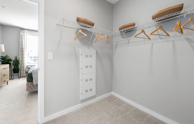 A room with a white wall and a white closet with clothes hangers at Madison Prickett Preserve, Pennsylvania, 19067