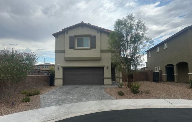 NW!! Gated!! Built 2023!!!! Corner Lot!! Low Maintenance Desert Landscape Front!! Patio & Synthetic Grass in Back!! Pet Friendly!!