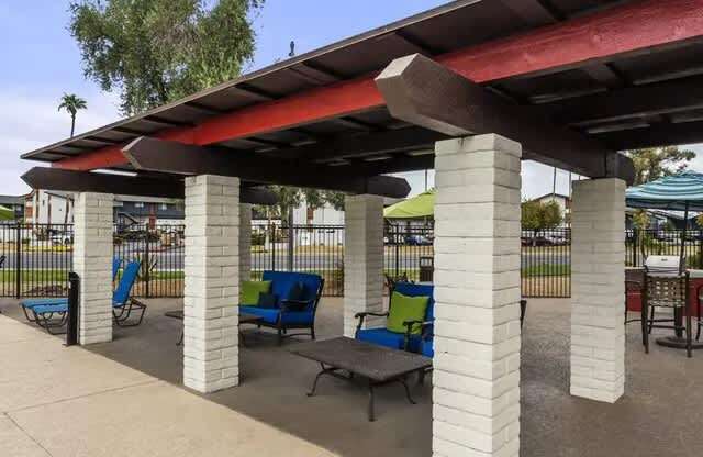 A white pillar with a red roof.