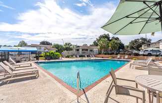 sparkling pool and sundeck at 701 South Apartments in Mobile, AL