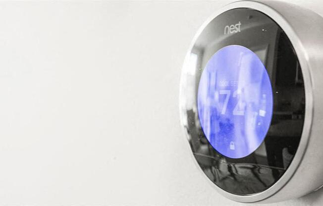 a close up of a mirror with a blue reflection