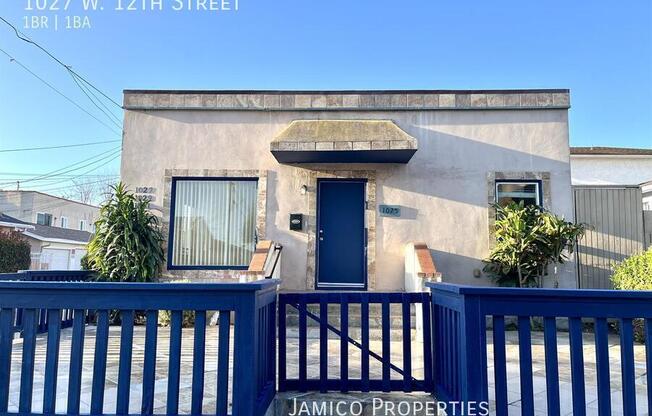 1027 W 12 ST