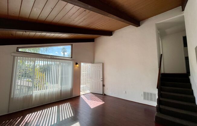 Fabulous Duplex Unit with Vaulted Ceilings and Large Backyard
