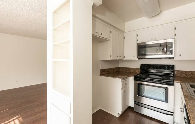 Kitchen with Stainless Steel Appliances and White Cabinets