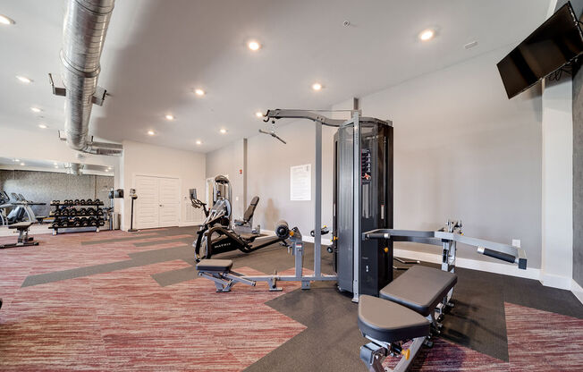 the gym at the flats at big tex apartments