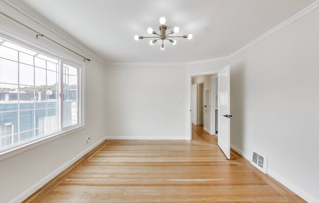 Beautiful Updated 3BD/2BA + Bonus Room Home with Private Yard & Garage