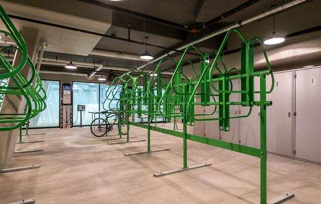 a row of green pipes in a room