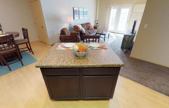 kitchen island, cabinets at Stonebridge Villas Apartments, Minot