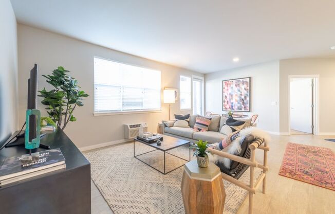 a living room with a couch and a coffee table