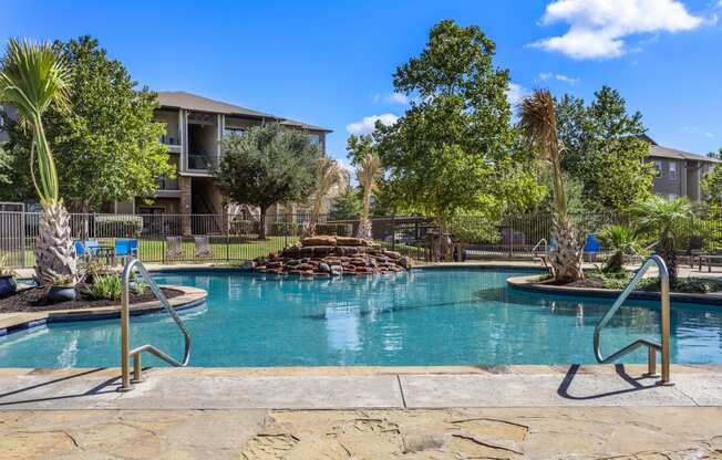 pool at the enclave at woodbridge apartments in sugar land, tx