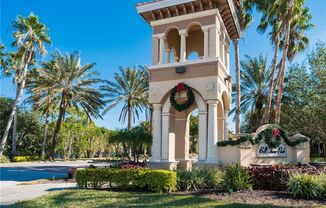 Experience Bell Tower Park. GATED ground floor 2 Bed 2 Bath Den 1 Car Garage Condo.