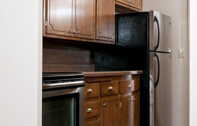 Tile Flooring, Wood Cabinetry at Boulevard 100 Apartments in St. Louis Park, MN