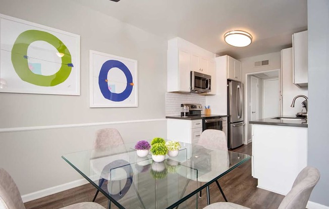 Glass table in Living Room at Los Robles Apartments, California